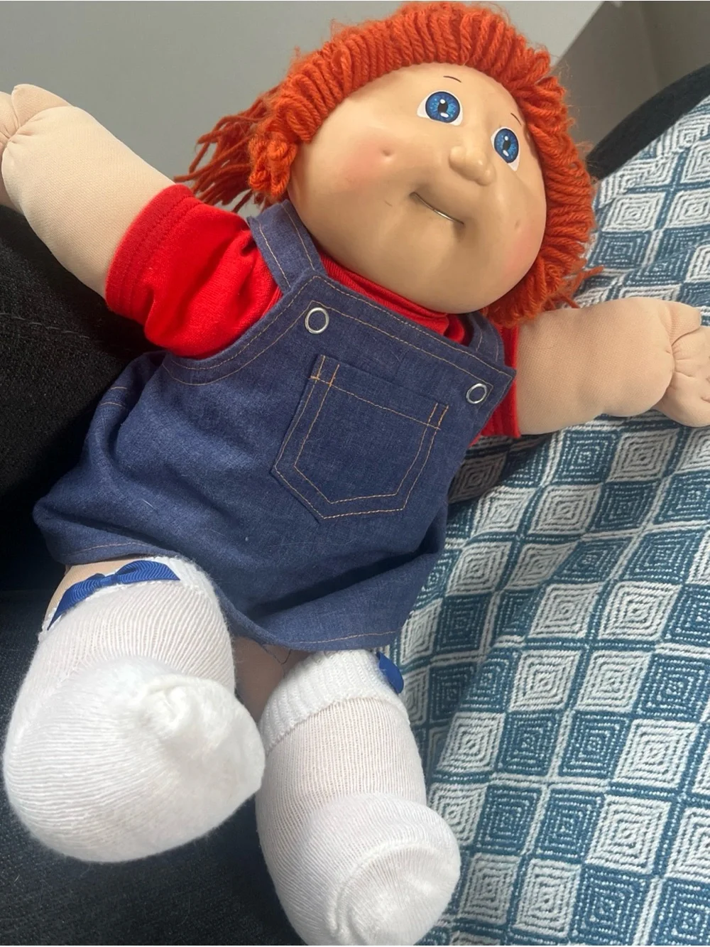 Orange-Haired  Cabbage Patch  Kids Doll with Blue Eyes has tooth retainers